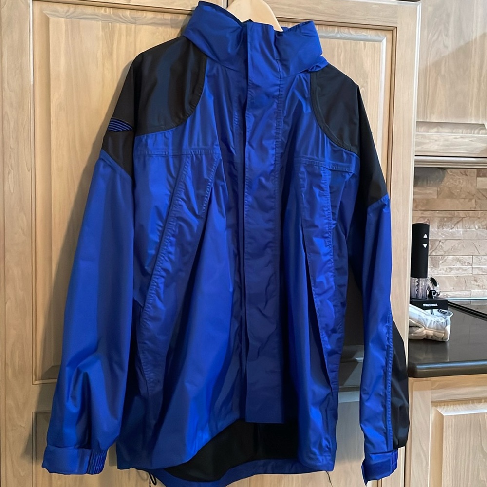 Bass Pro windbreaker with Harley Davidson logos.